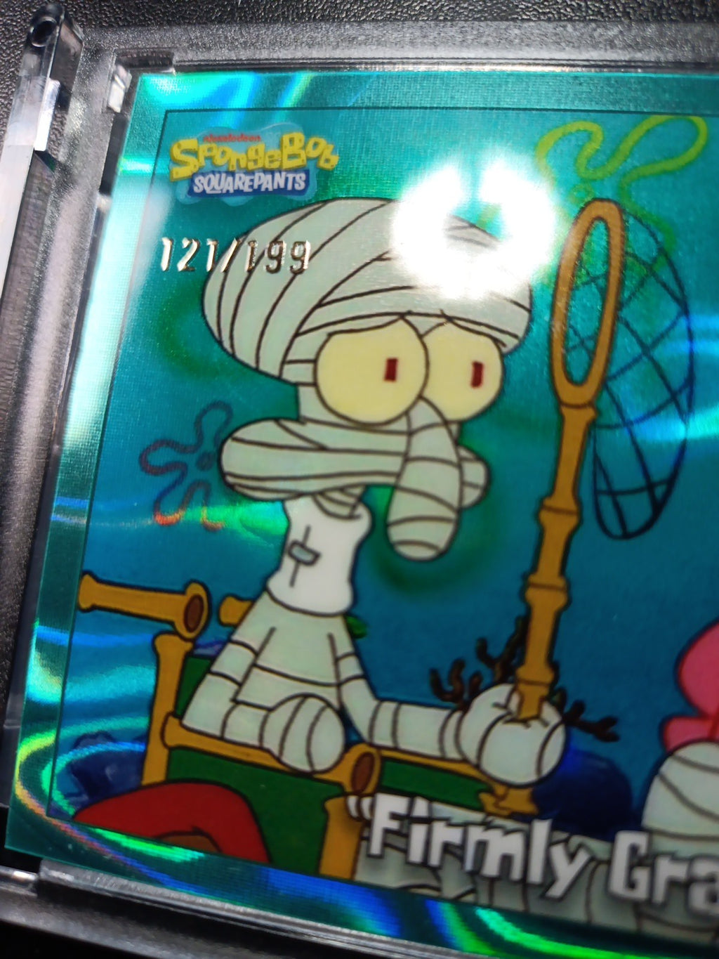 SpongeBob 121/199 Firmly Grasp It Squidward Aqua Lava Refractor Card Topps /199