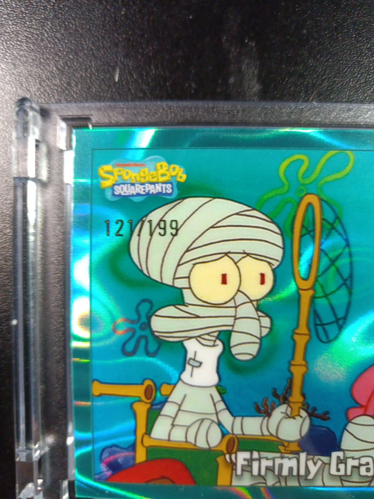 SpongeBob 121/199 Firmly Grasp It Squidward Aqua Lava Refractor Card Topps /199