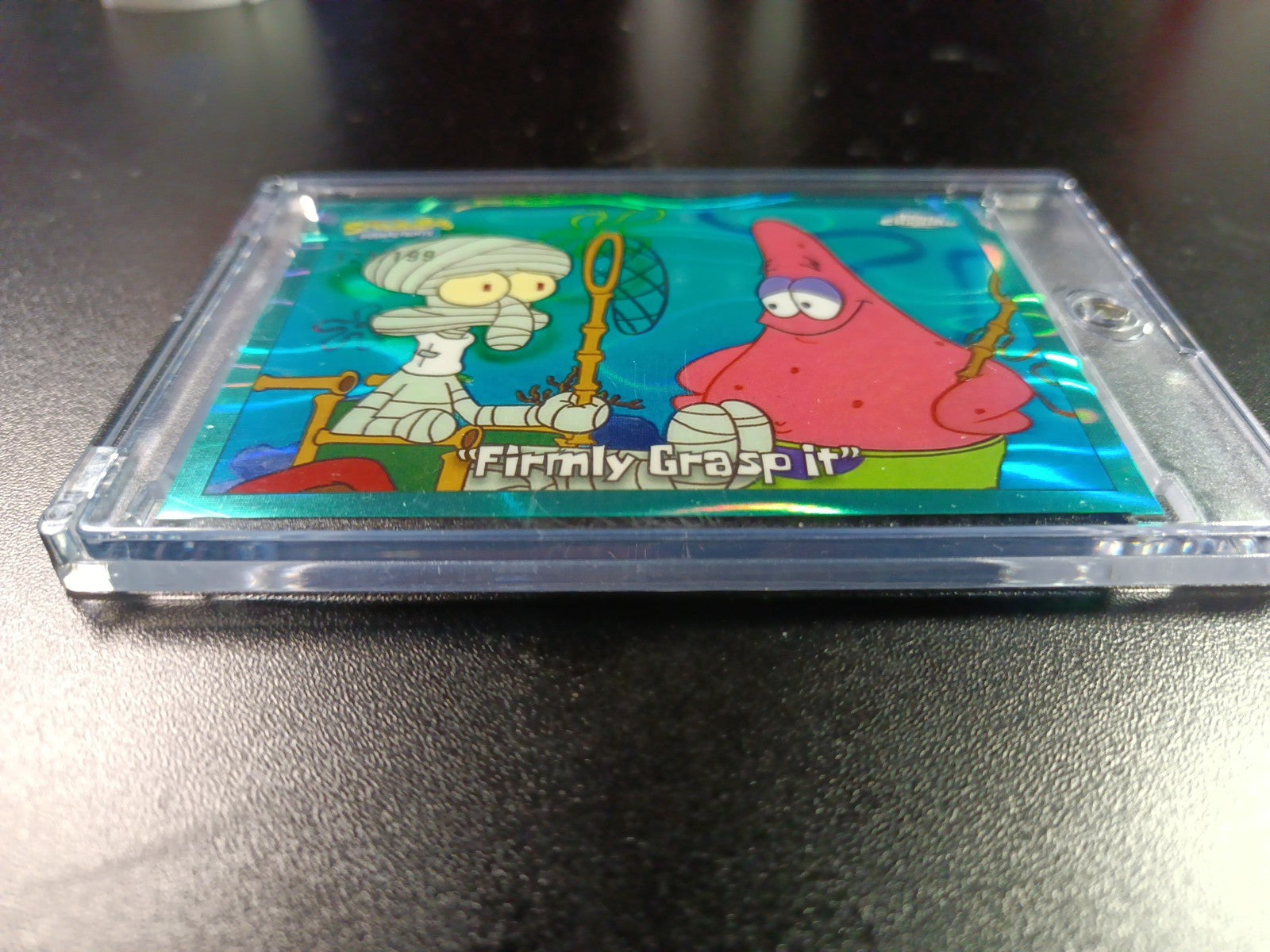 SpongeBob 121/199 Firmly Grasp It Squidward Aqua Lava Refractor Card Topps /199